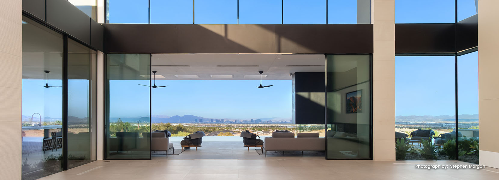 Frameless glass walls connecting indoor and outdoor living in Texas — Ironwood Windows & Doors