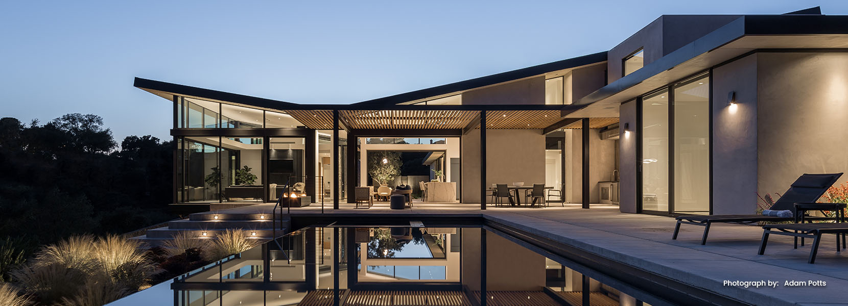 Modern Texas residence with floor-to-ceiling Fleetwood glass installed by Ironwood